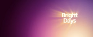 The words Bright Days glowing with flairs of white light on a purple background to announce the Philips Hue lighting sale.