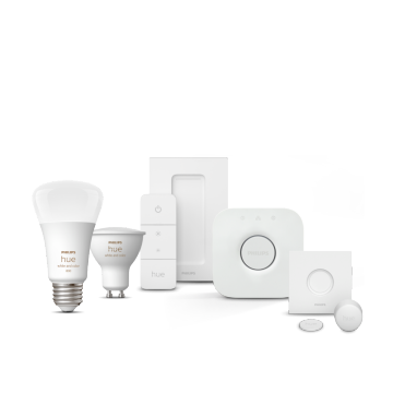 Collection of Philips Hue bulbs, smart home light switches, and Hue Bridge