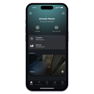 The Hue app showing armed Hue secure devices with a live video of a porch recorded by a 2K Hue Secure camera.