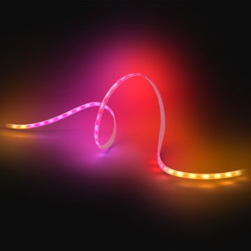 A strip light shining in a gradient of multiple colours