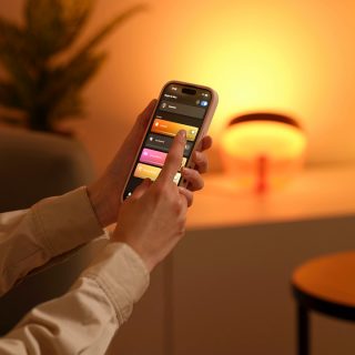 A close-up of somebody adjusting their lights using the Hue app