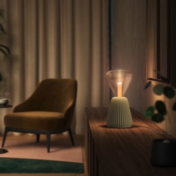 Living room with Lightguide table lamp on table and chair in background