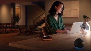 Couple using Amazon Alexa to turn on Philips Hue smart lights